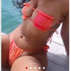 3 swimsuits and one dress